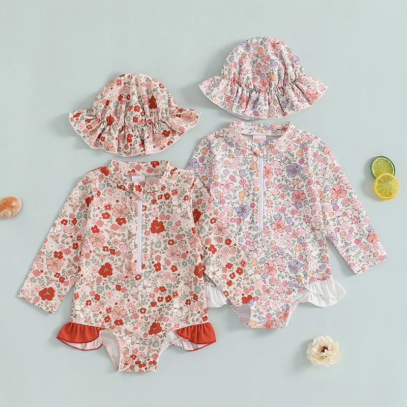 Maiô infantil feminino com proteção UV, estampa floral e babados. Inclui touca de natação. Conforto e estilo para sua pequena.
