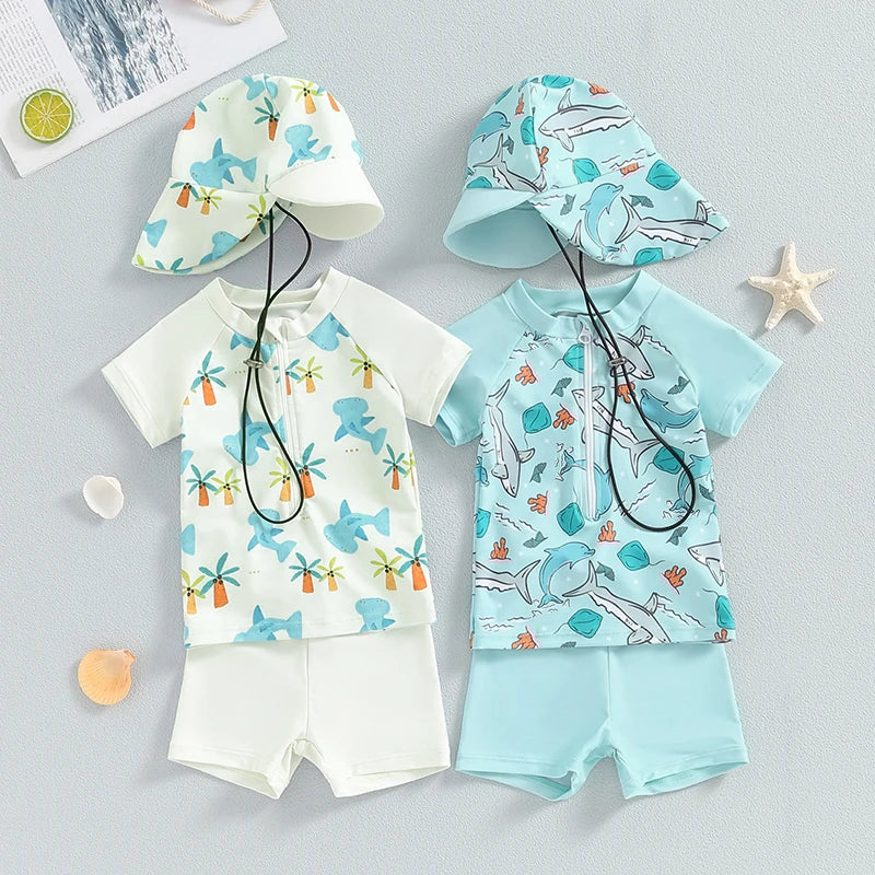 Conjunto de praia infantil com estampa de tubarão. Proteção UV, conforto e diversão para o verão. Inclui camiseta, sunga e chapéu.