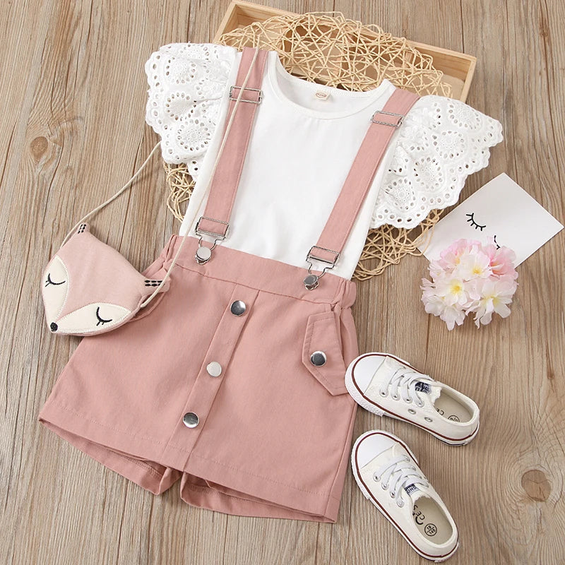 Conjunto de Jardineira e blusa com manga de gripir