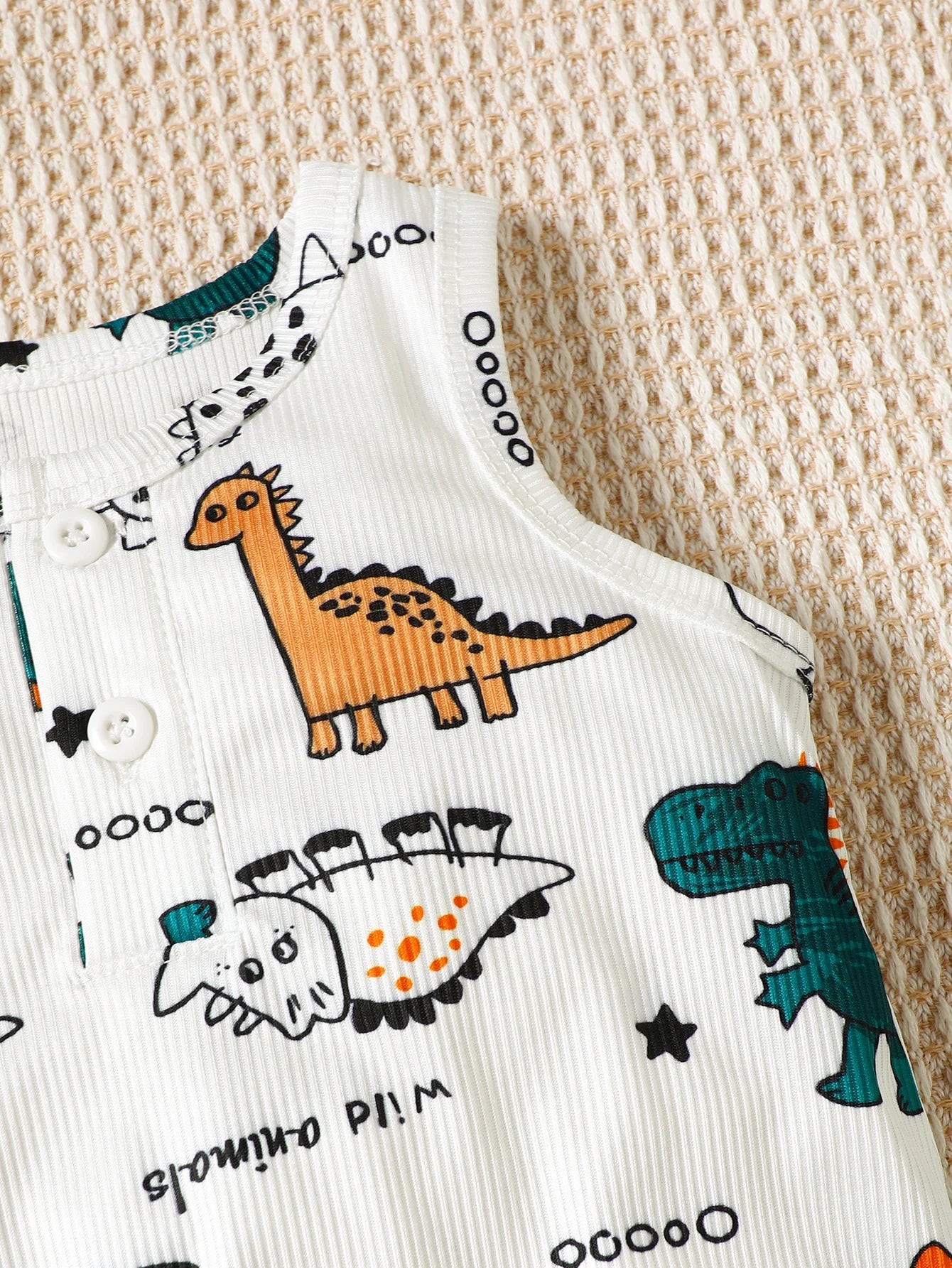 Conjunto Bebê Dinossauro: Body e Chapéu Estampados