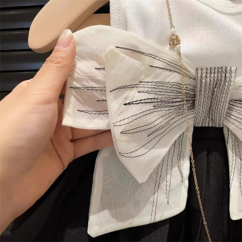 Conjunto Infantil Elegante: Colete e Saia Plissada