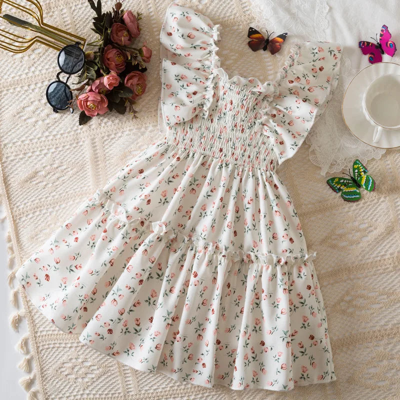 Vestido floral de princesa para meninas, ideal para festas. Design elegante com manga voando e gola quadrada.