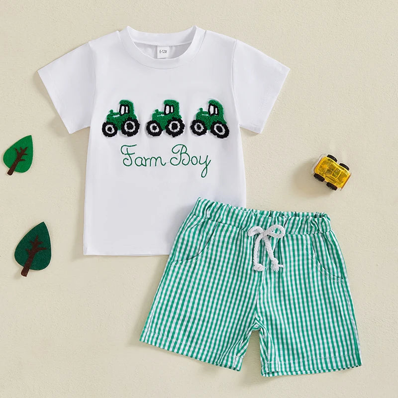 Conjunto Bebê Menino - Camiseta Bordado Trator e Shorts Xadrez (2 Peças), este conjunto é perfeito para o seu bebê menino ficar confortável e estiloso! A camiseta possui um bordado de trator que dá um toque divertido ao look, combinando perfeitamente com o shorts xadrez.