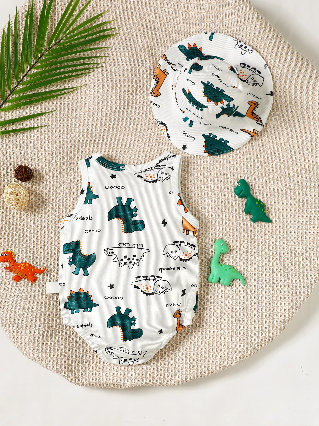 Conjunto Bebê Dinossauro: Body e Chapéu Estampados