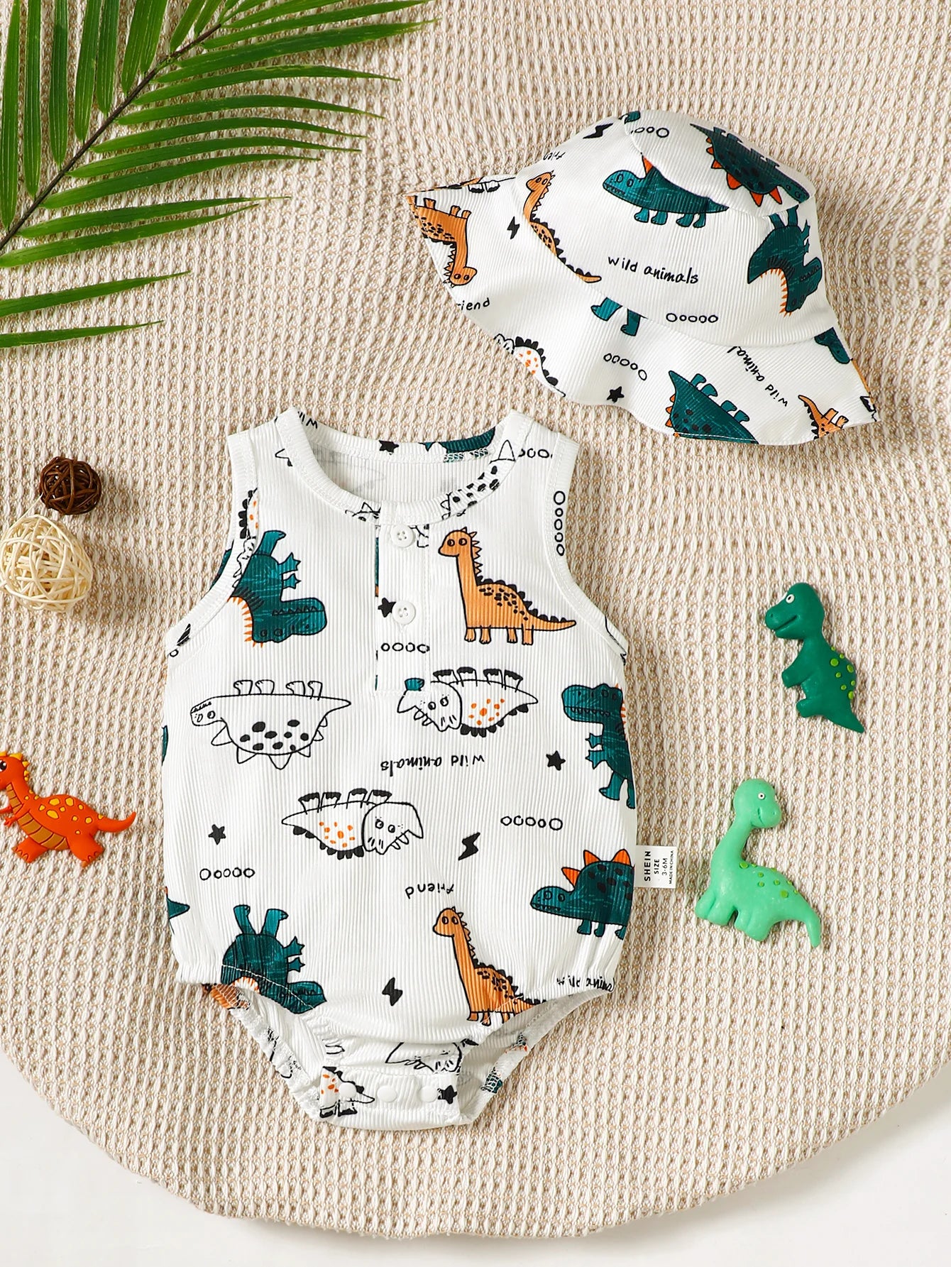 Conjunto Bebê Dinossauro: Body e Chapéu Estampados