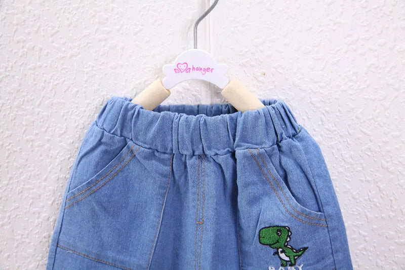 Conjunto roupa infantil dinossauros camiseta e bermuda