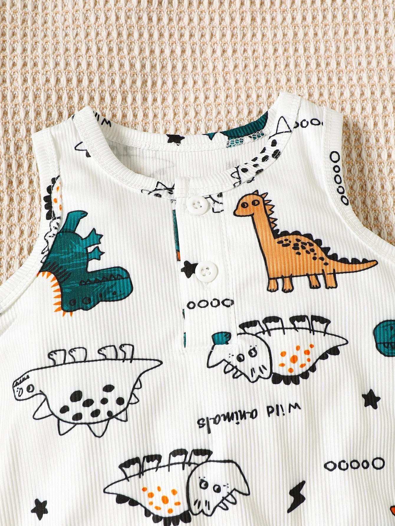 Conjunto Bebê Dinossauro: Body e Chapéu Estampados